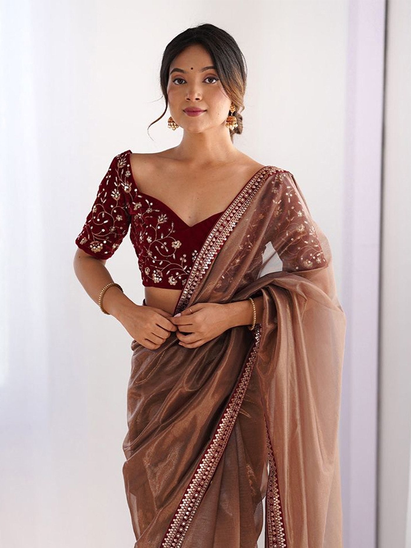 Brown Net Saree with Velvet Embroidered Blouse